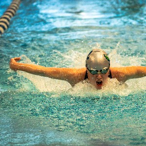 Swimmer competing in the butterfly